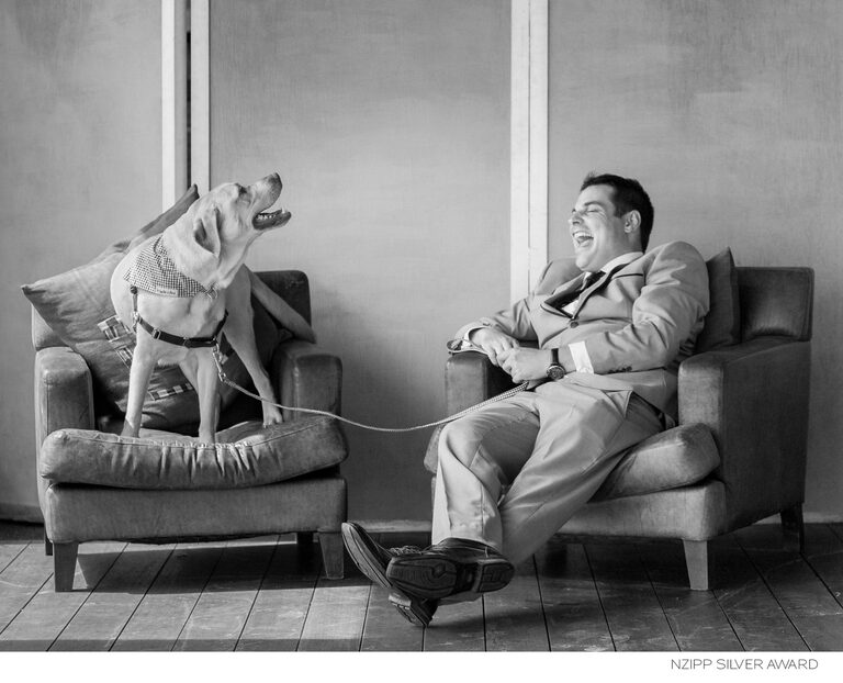 Award-winning silver photo taken by Alicia Scott, Wellington pet photographer, of Gareth and his dog both laughing