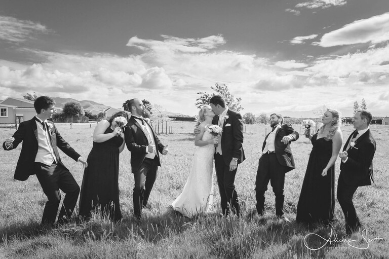 Image of bridal party in the Martinborough fields at Brackenridge taken by Alicia Scott - Wairarapa wedding photographer