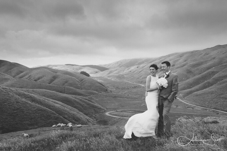 Photo of Boomrock wedding couple overlooking the valley taken by Alicia Scott, Wellington wedding photographer