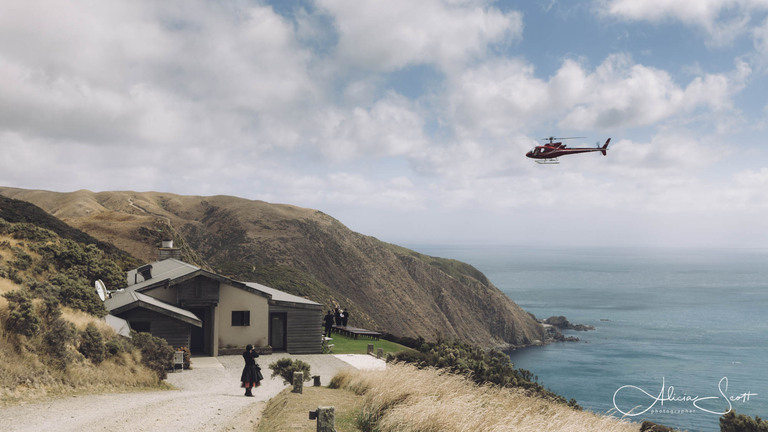 Photo of helicopter about to land at Boomrock Lodge taken by Alicia Scott, Wellington wedding photographer