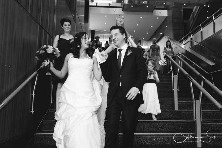 Photo of wedding couple leaving Te Papa taken by Alicia Scott, Wellington wedding photographer